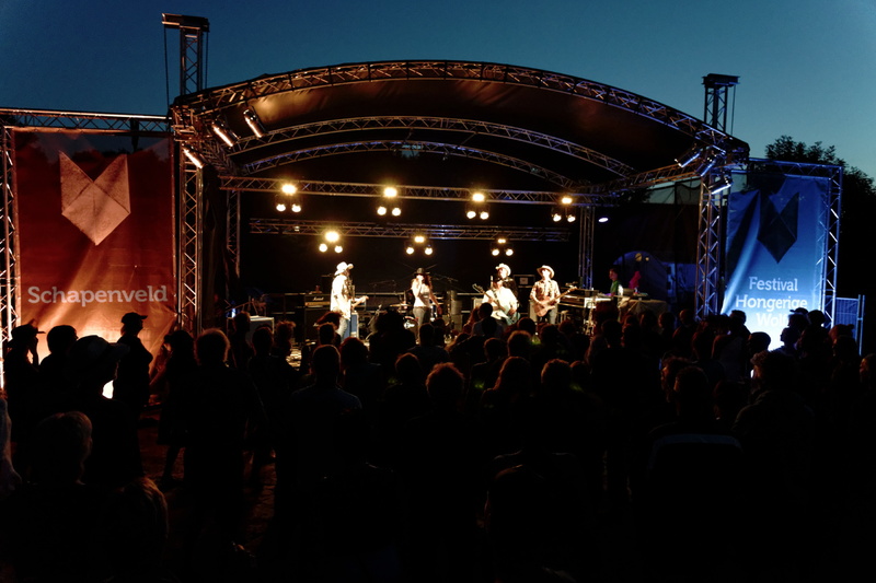 white cowbell oklahoma on stage